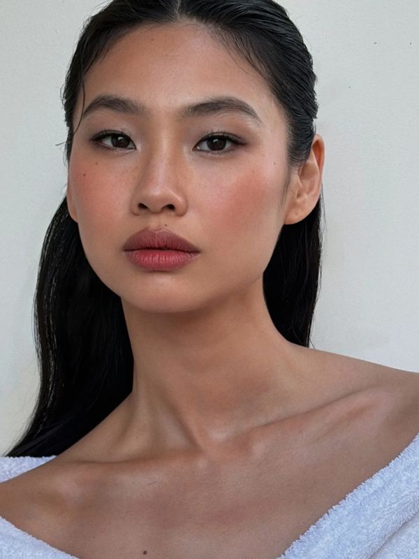 Portrait showing a soft, muted makeup look